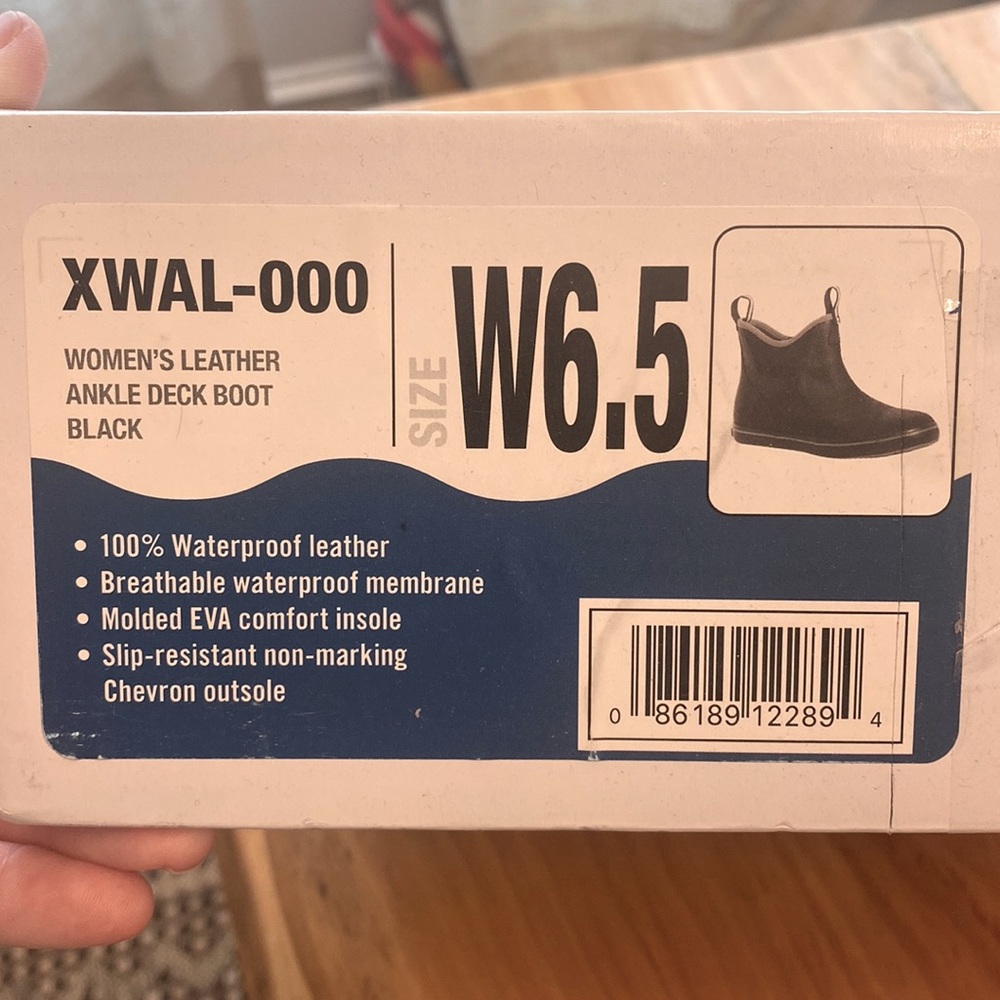 XTRATUF women’s leather ankle deck boots.